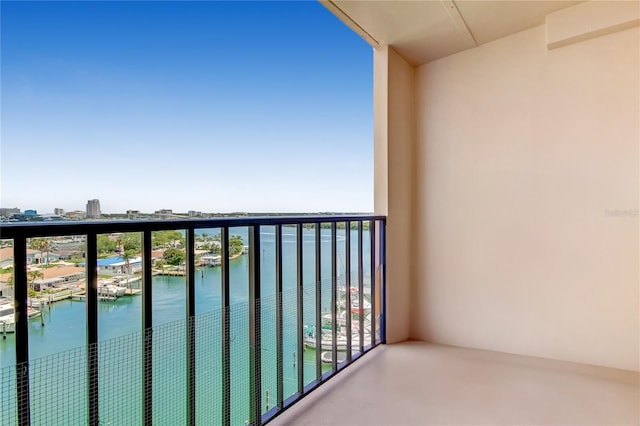 balcony featuring a water view