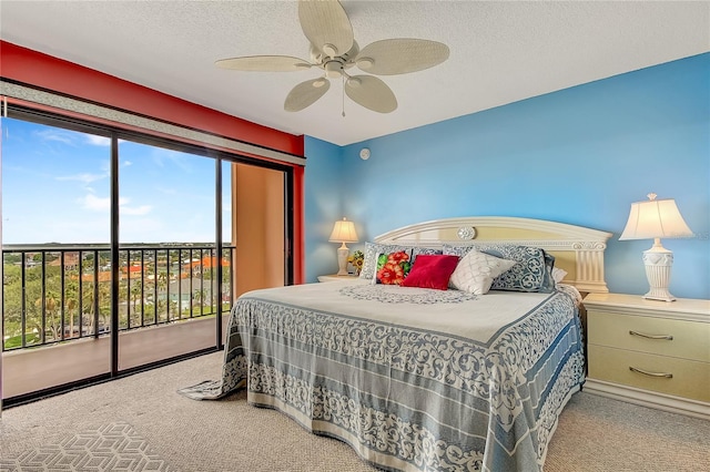 bedroom with a textured ceiling, ceiling fan, access to exterior, and light carpet