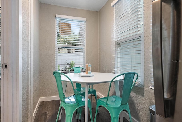 dining room with hardwood / wood-style floors