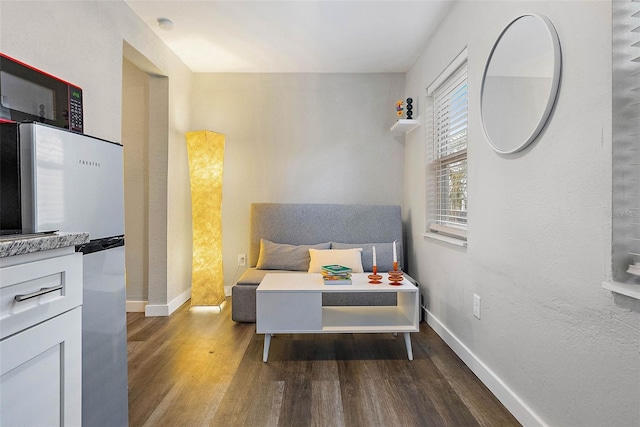 bedroom featuring dark wood-type flooring