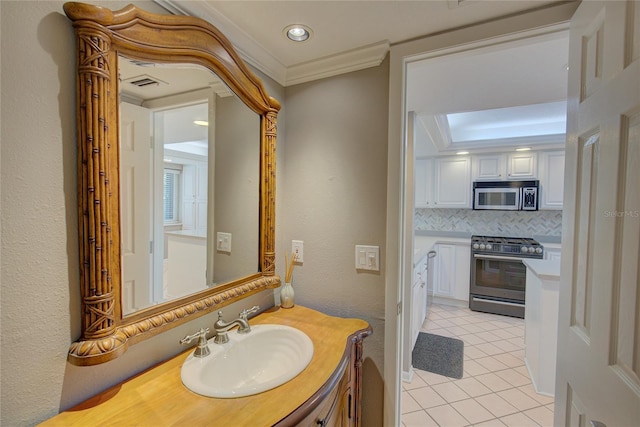 bathroom featuring visible vents, tasteful backsplash, crown molding, tile patterned flooring, and a textured wall