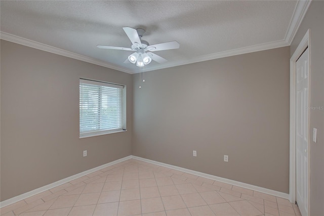 unfurnished room featuring a textured ceiling, ceiling fan, and ornamental molding