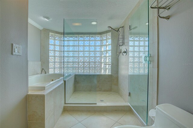 bathroom with toilet, separate shower and tub, tile patterned flooring, a textured ceiling, and ornamental molding