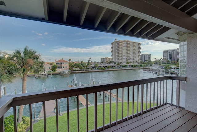 balcony featuring a view of city and a water view