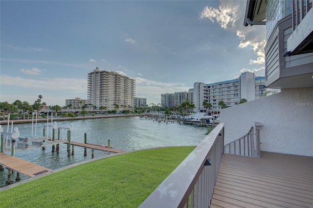 exterior space featuring a water view and a boat dock