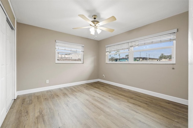 interior space featuring light hardwood / wood-style flooring, a wealth of natural light, and ceiling fan