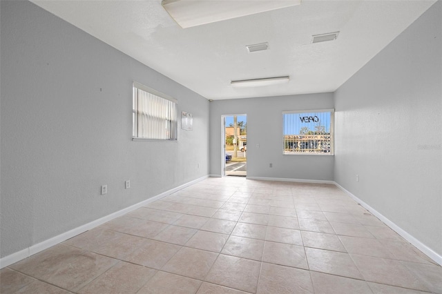 view of tiled empty room