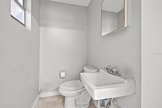 bathroom with sink and toilet