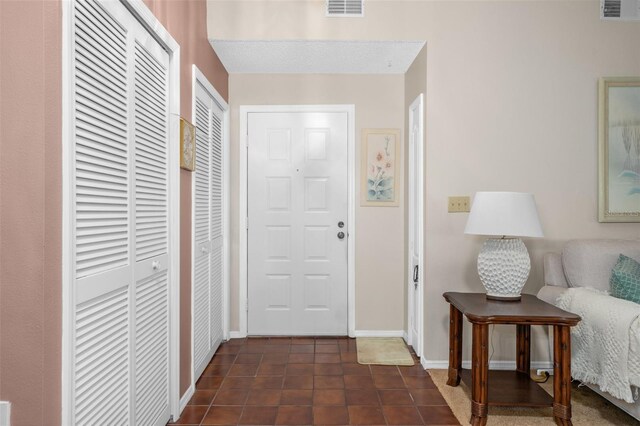 view of tiled foyer entrance