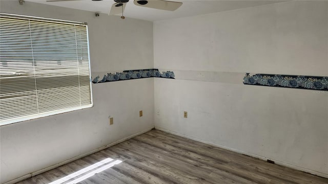 spare room with ceiling fan and light hardwood / wood-style floors