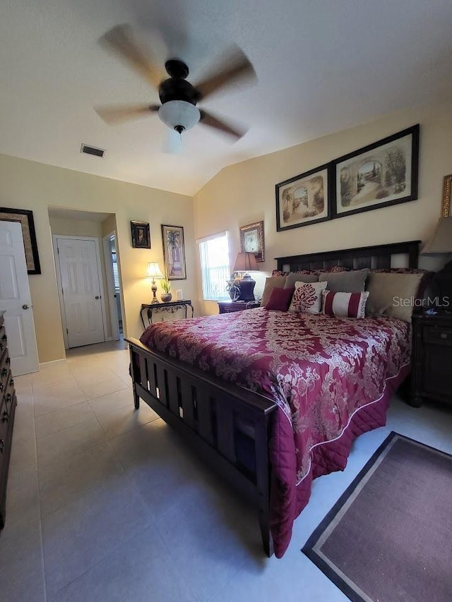 bedroom with lofted ceiling and ceiling fan