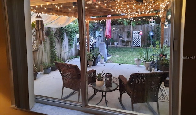 view of patio featuring a pergola