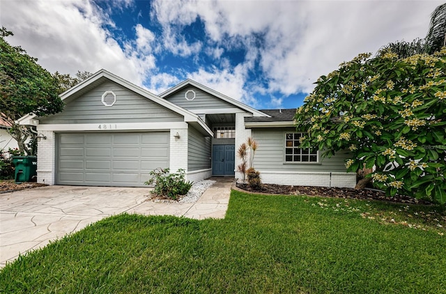 ranch-style house with a front lawn and a garage