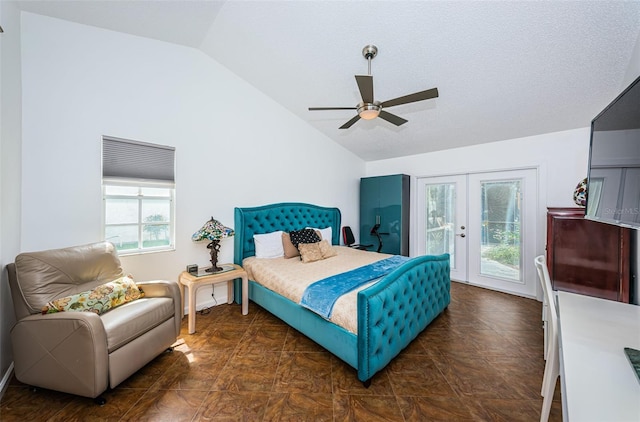 bedroom with lofted ceiling, access to outside, french doors, ceiling fan, and multiple windows