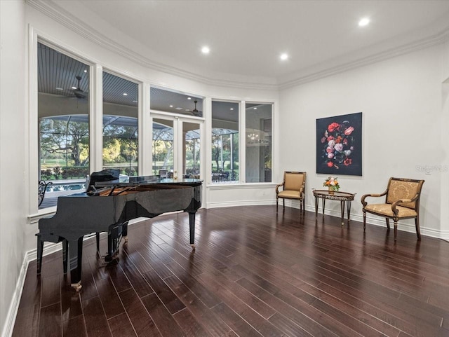 misc room with dark hardwood / wood-style floors and ornamental molding