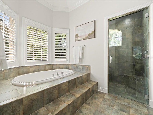 bathroom featuring shower with separate bathtub and ornamental molding