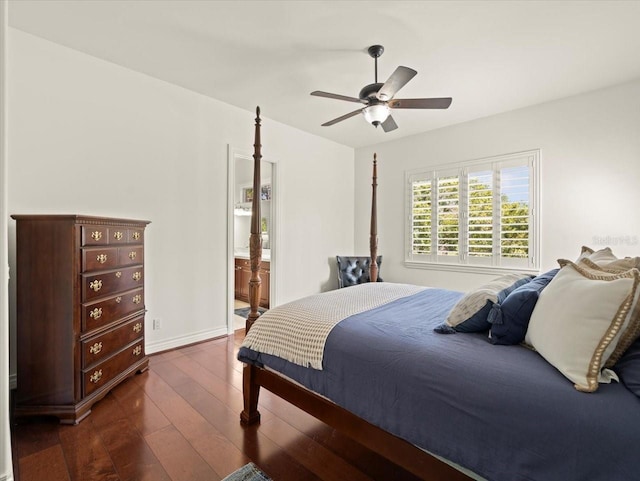 bedroom with connected bathroom, ceiling fan, and dark wood-type flooring