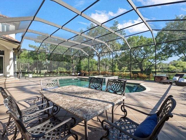 view of pool featuring a lanai and a patio area