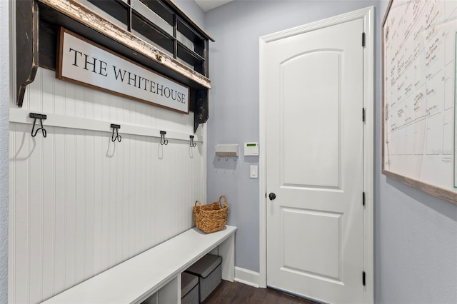 mudroom with dark hardwood / wood-style floors