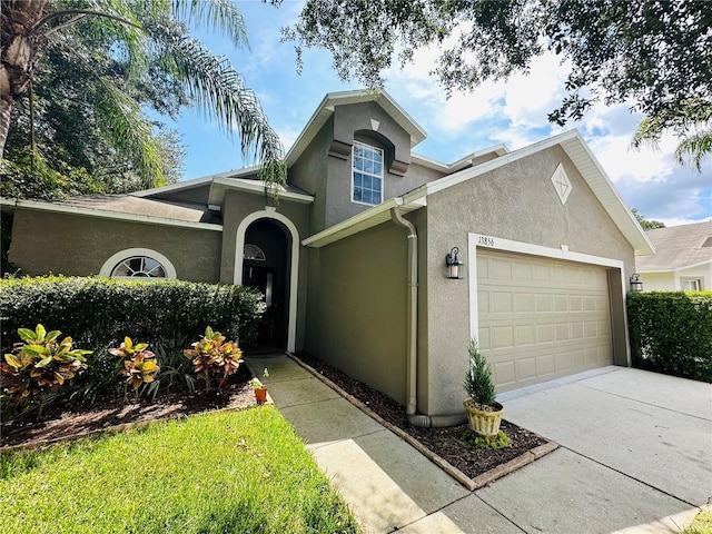 view of front of home with a garage