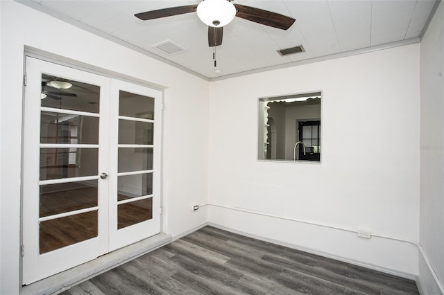 unfurnished room featuring ceiling fan, sink, and dark hardwood / wood-style floors