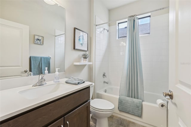 full bathroom with toilet, vanity, and shower / tub combo with curtain