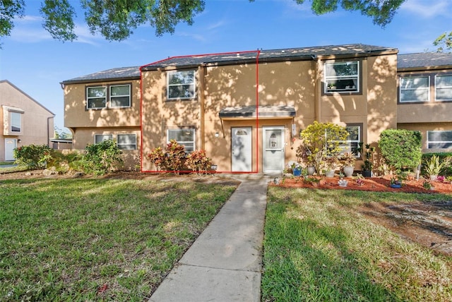 view of front of house with a front yard