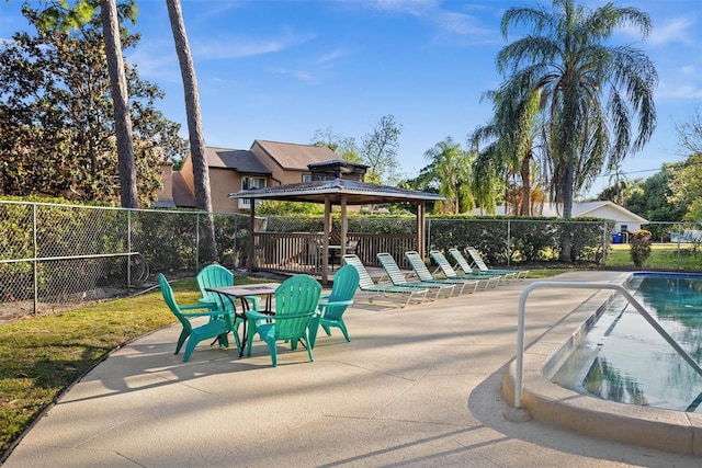 view of pool featuring a gazebo and a patio