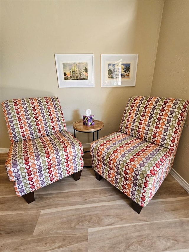 sitting room with light wood-type flooring