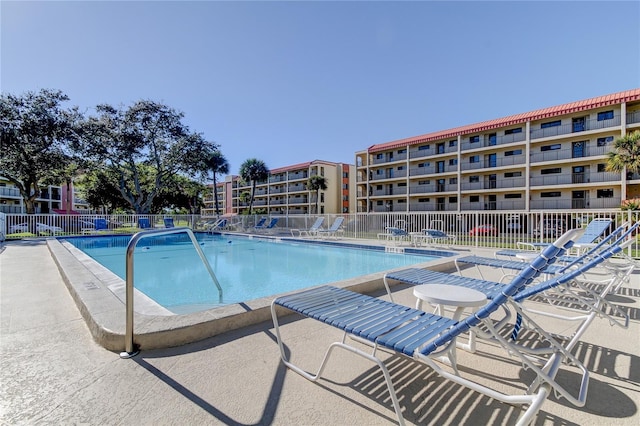 view of swimming pool featuring a patio