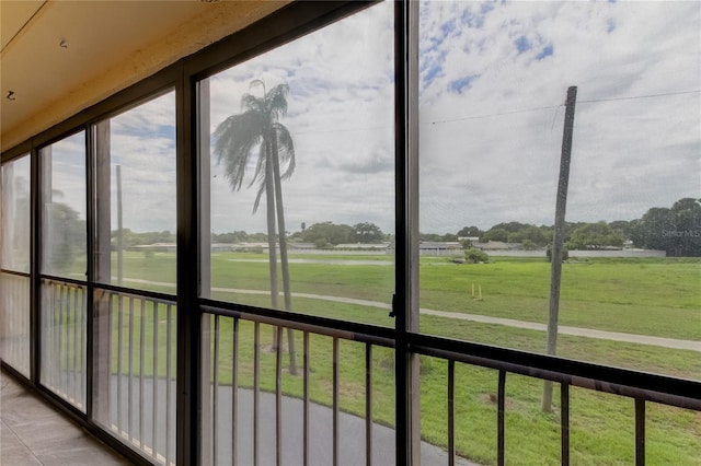 unfurnished sunroom with plenty of natural light