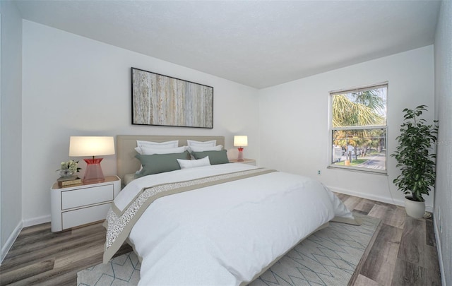 bedroom featuring hardwood / wood-style floors