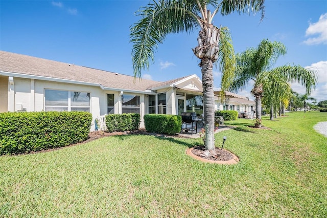 exterior space featuring a front yard