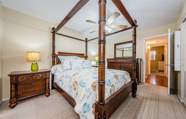 carpeted bedroom with ceiling fan