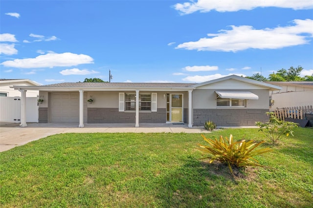 ranch-style house with a garage and a front yard