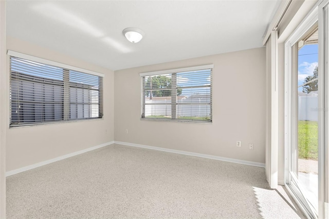 view of carpeted spare room