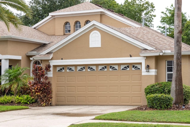 view of front property with a garage