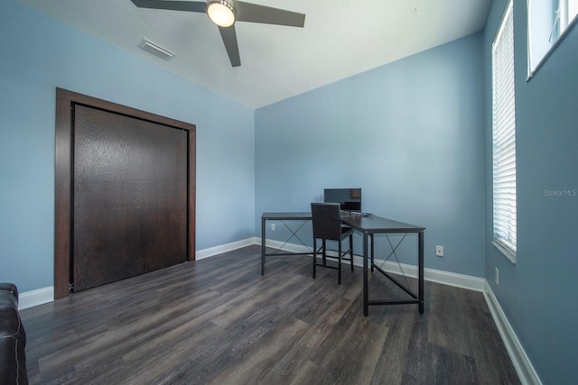 home office featuring ceiling fan and dark hardwood / wood-style floors