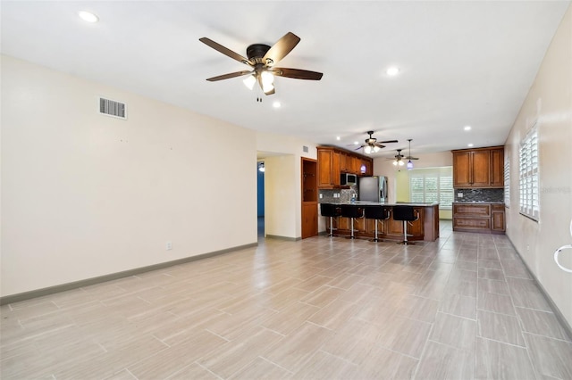 living room with ceiling fan