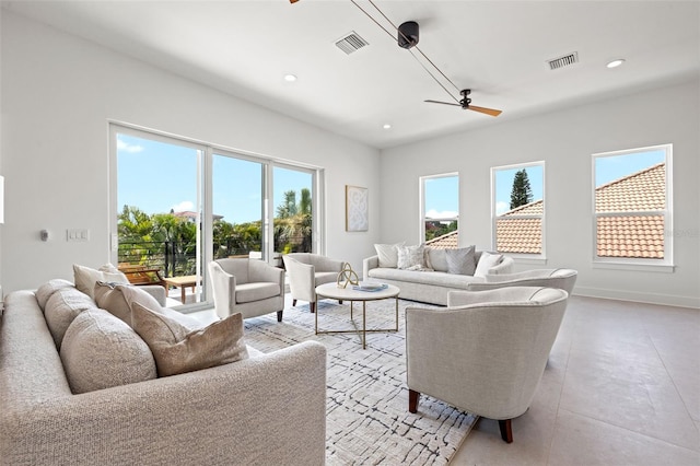 living room featuring ceiling fan