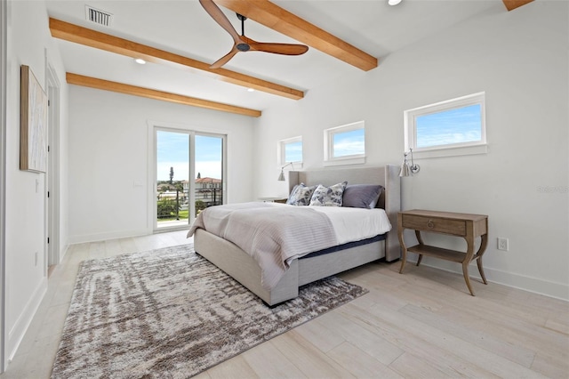 bedroom featuring beam ceiling, ceiling fan, light hardwood / wood-style floors, and access to outside