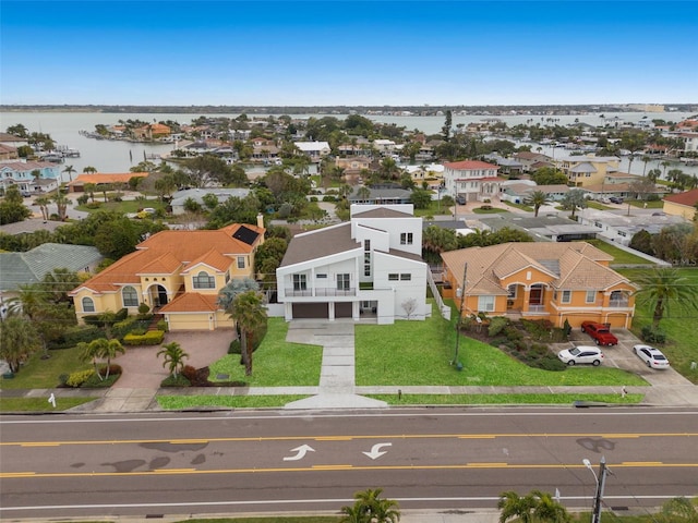 birds eye view of property featuring a water view