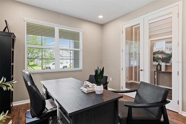 home office featuring dark hardwood / wood-style flooring