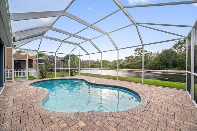 view of pool with a lanai and a patio area