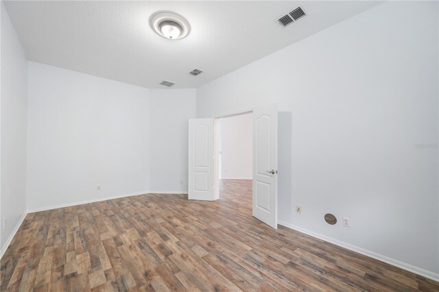 empty room featuring hardwood / wood-style floors