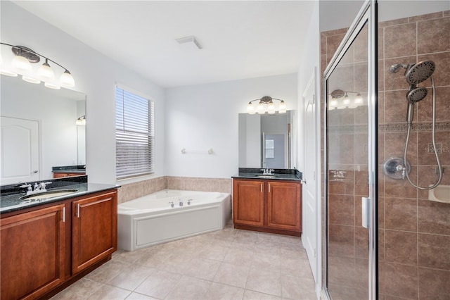 bathroom featuring vanity, tile patterned floors, and independent shower and bath