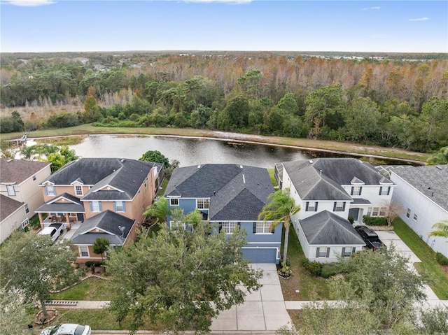 bird's eye view with a water view