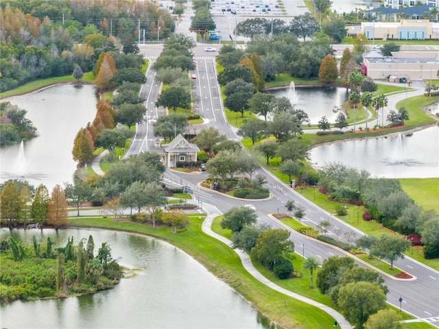 drone / aerial view with a water view