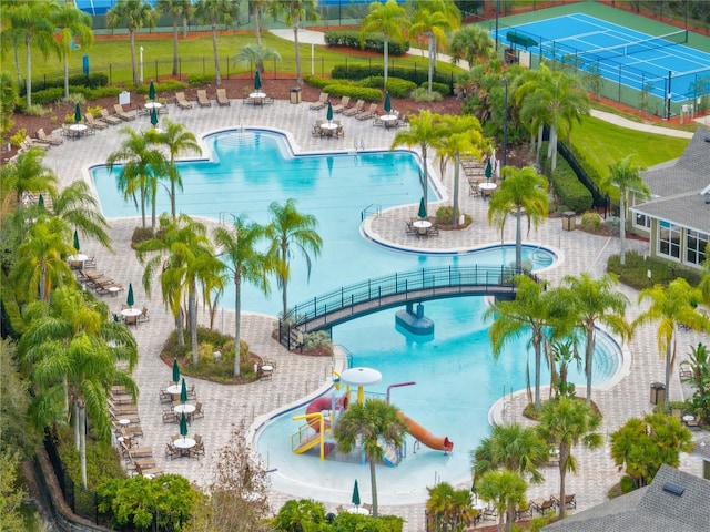 view of pool with a water slide