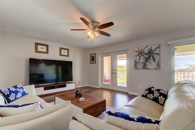 living room with french doors, hardwood / wood-style flooring, and ceiling fan